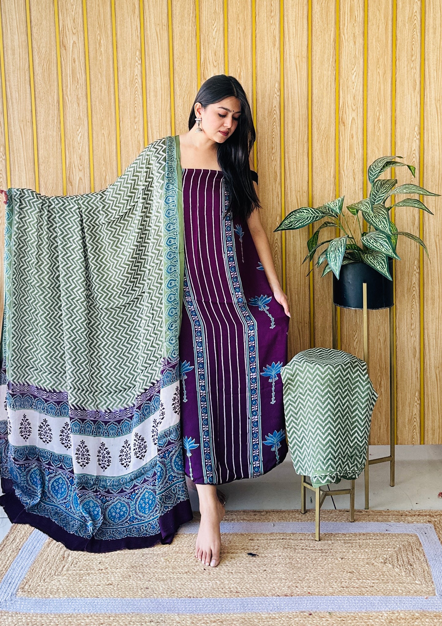 subtle charm wine and green dress material