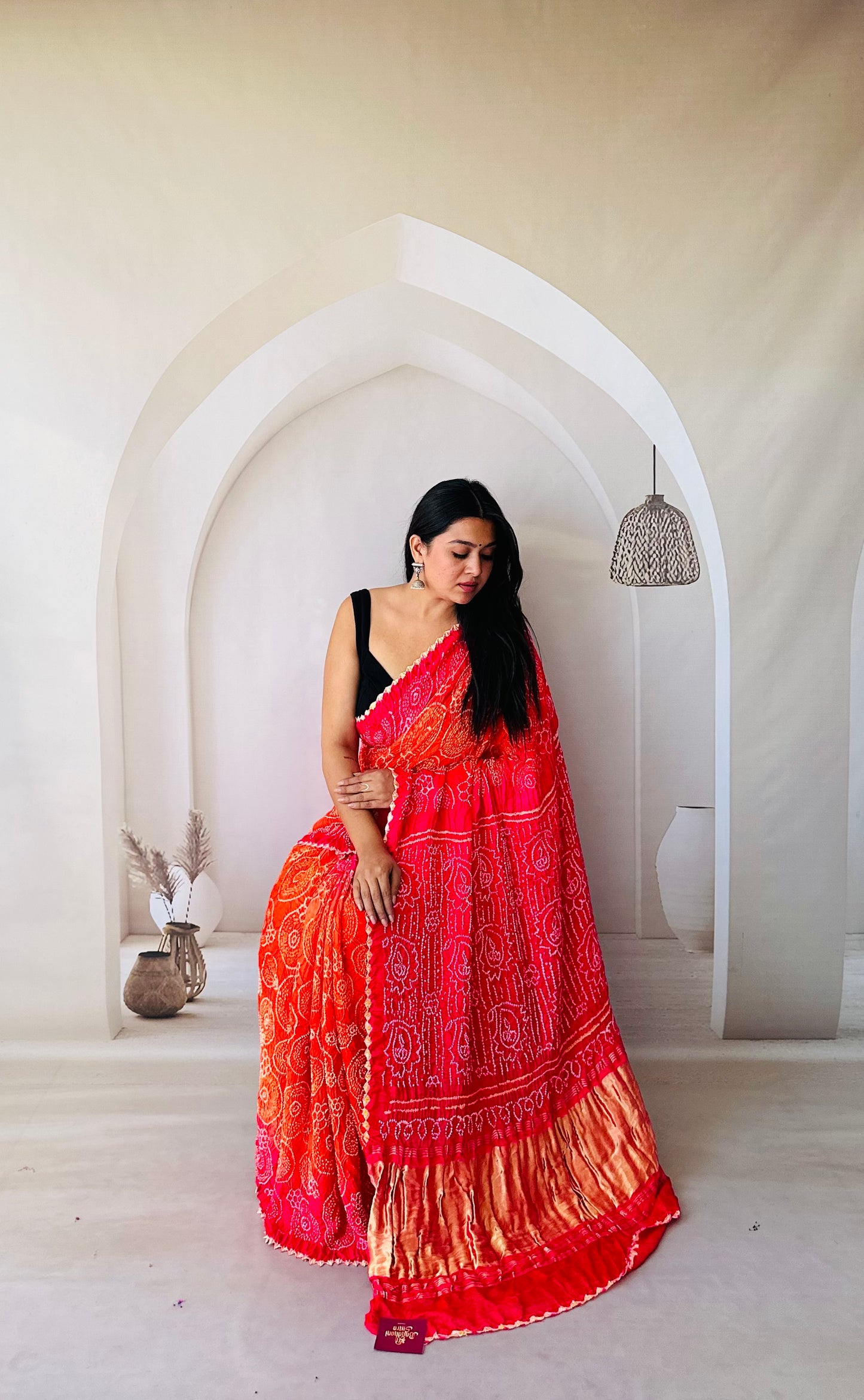 Silk charm hot pink and orange Bandhani saree