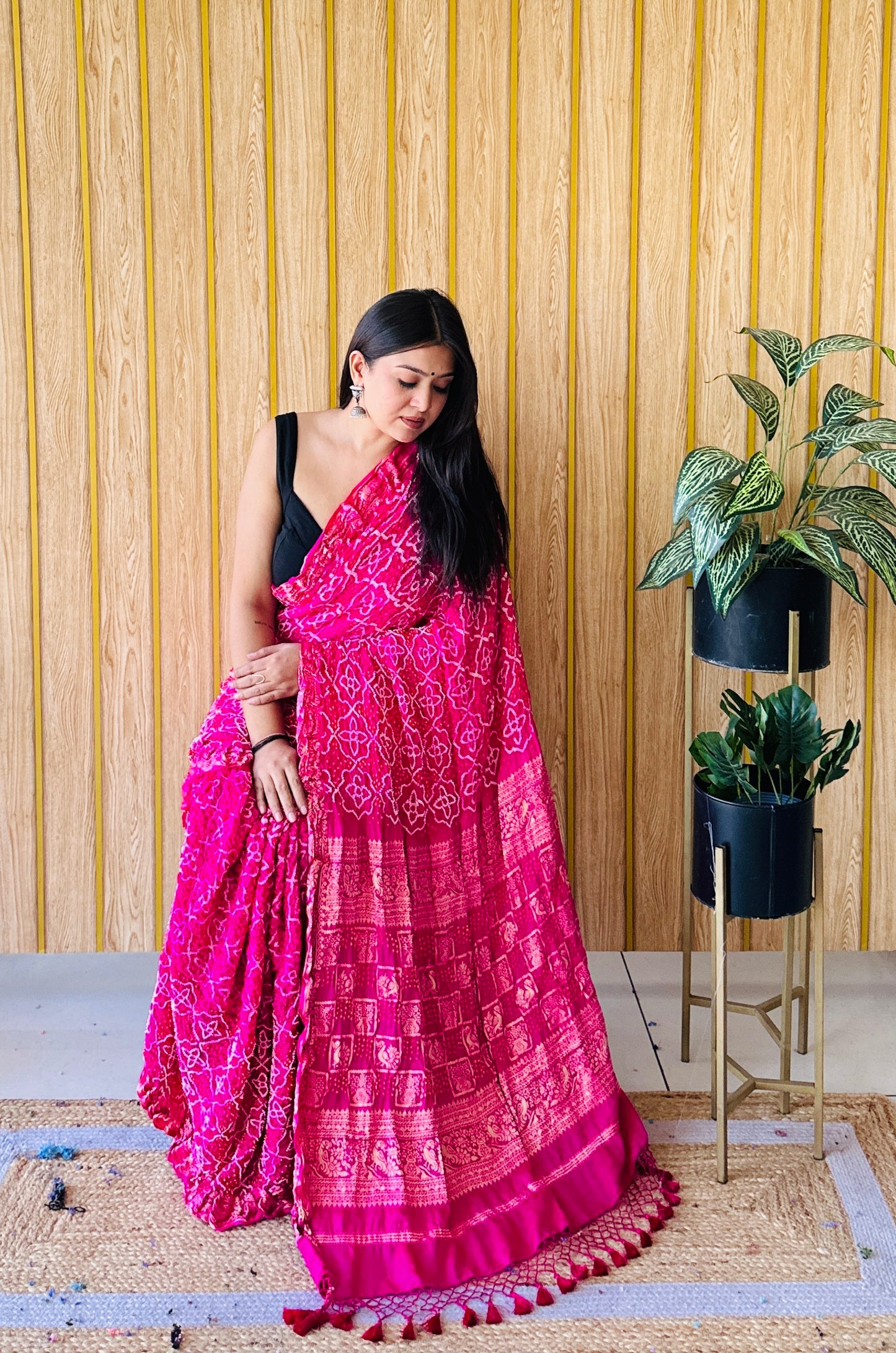 Radiant reflection rani pink bandhani saree