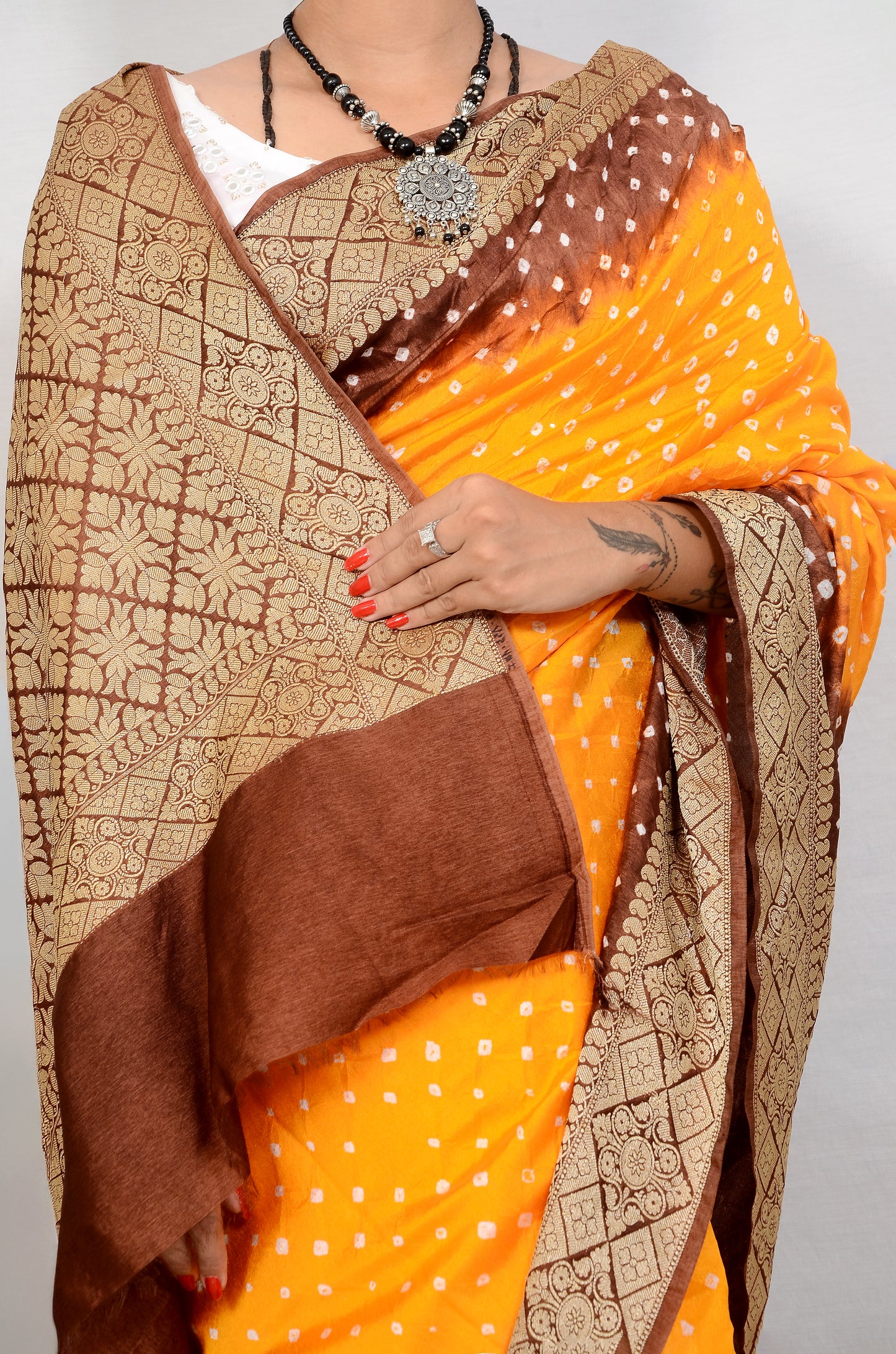 Maroon and bright yellow dupion silk bandhani saree