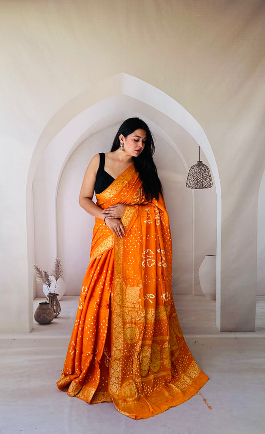 Enchanting Weaves Yellow bandhani saree