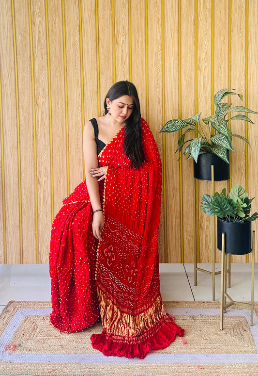 minimal majesty hot red bandhani saree