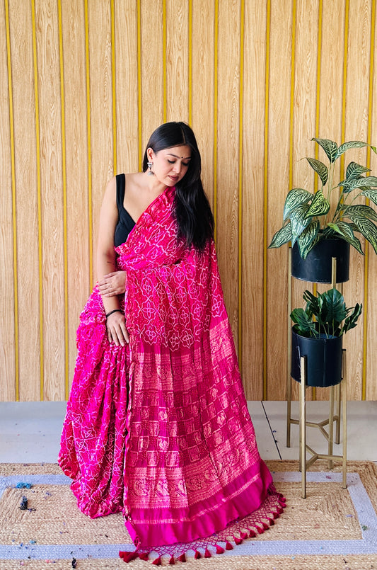 Radiant reflection rani pink bandhani saree