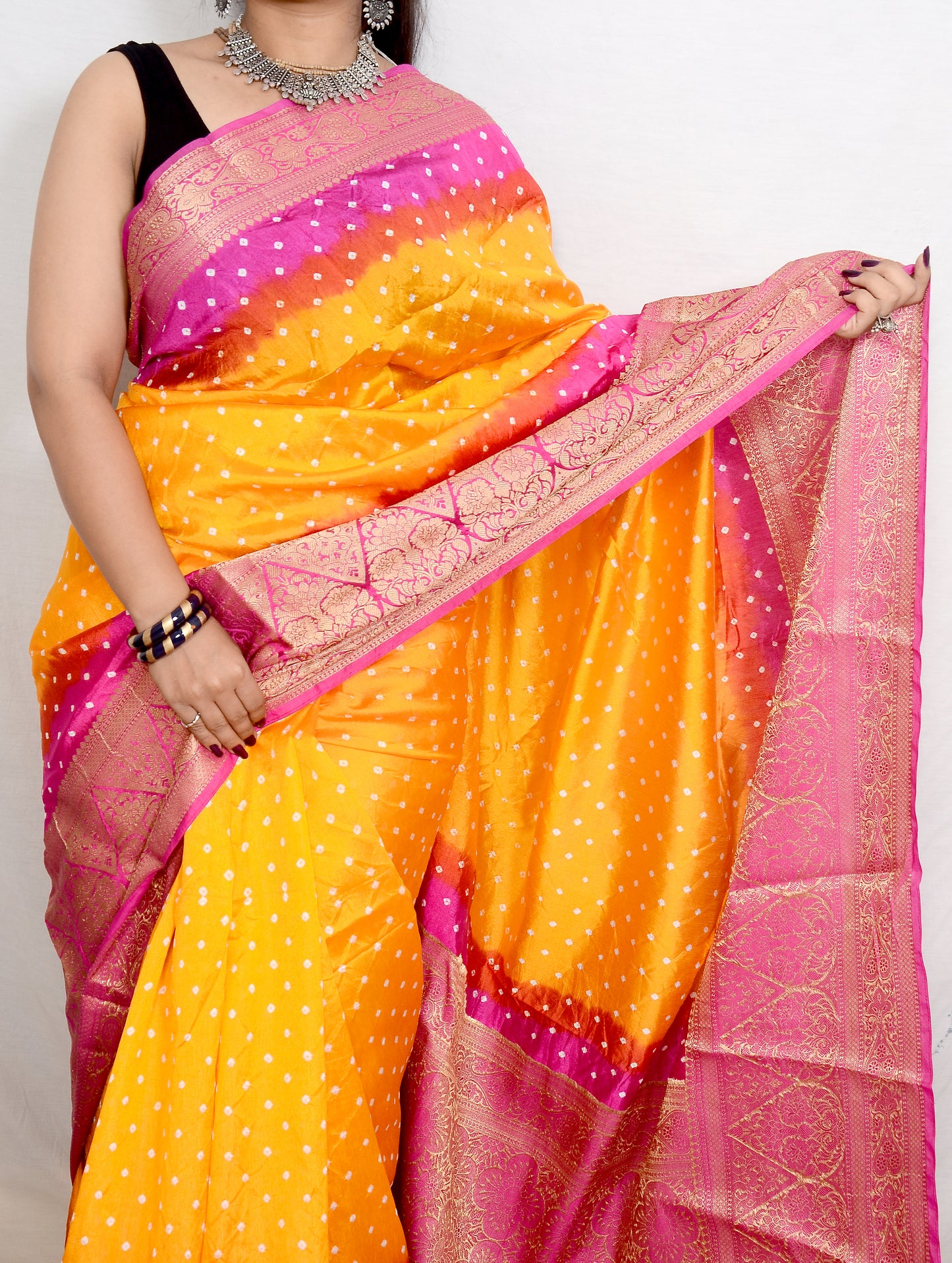 Bright yellow and Pink Dupion Silk Bandhani Saree