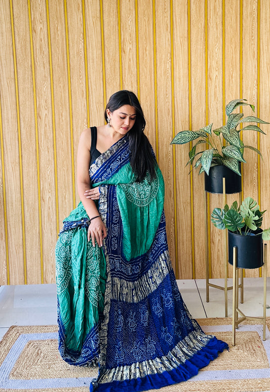 Festive flow blue and peacock green bandhani saree