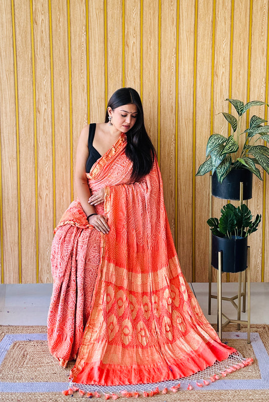 Eternal elegance light -dark orange bandhani saree