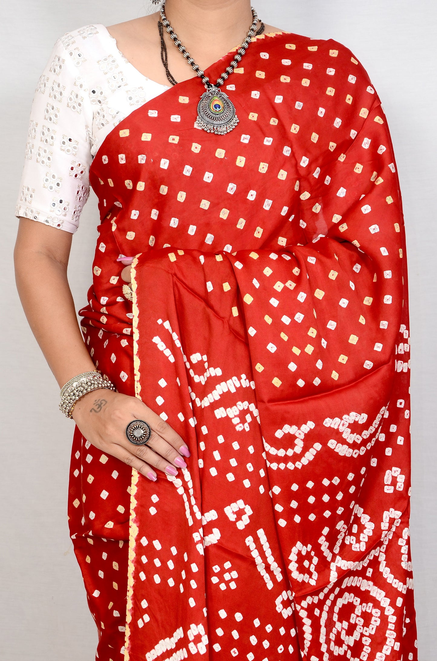 Red dani saree with edges