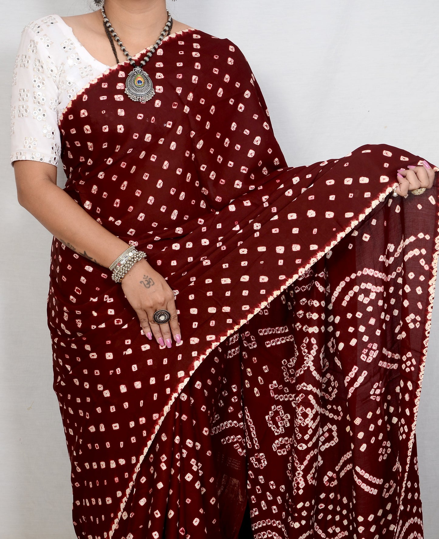 Maroon dani saree with edges