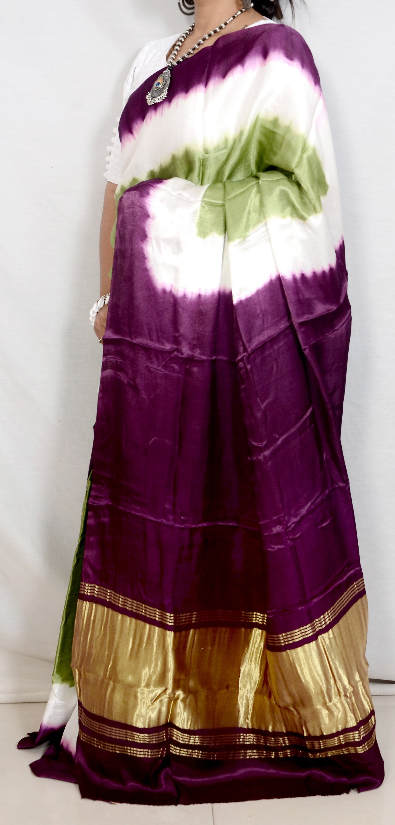 Ornate Legacy Green and Purple Modal Saree