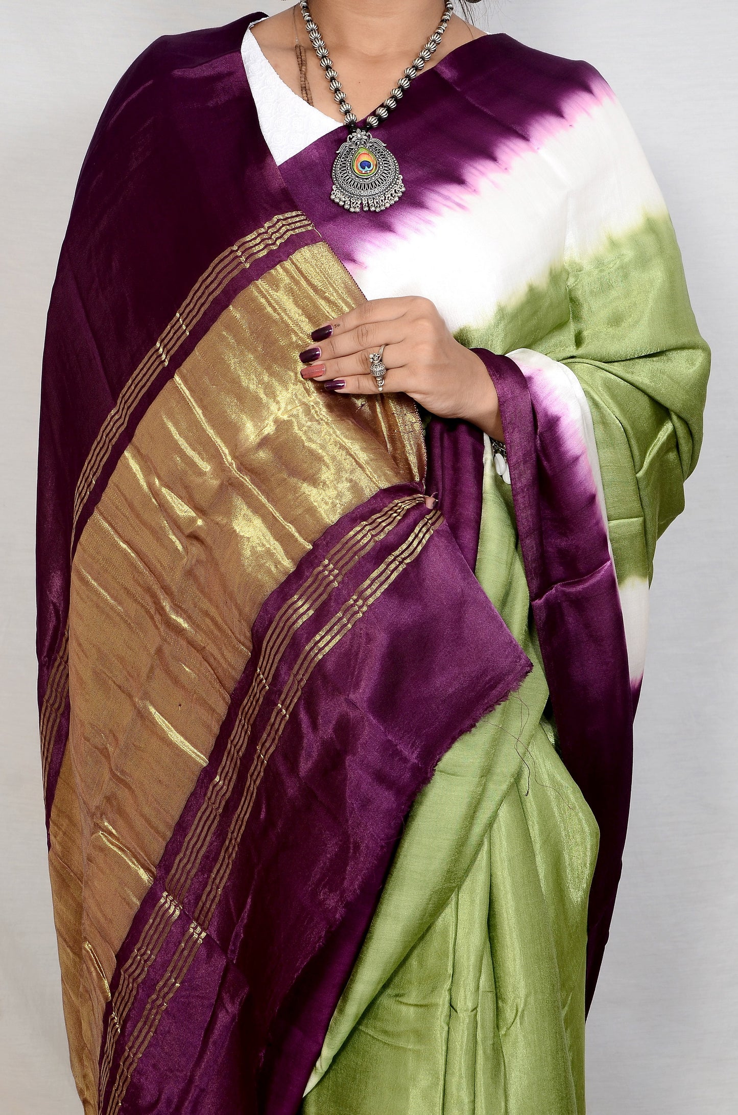 Ornate Legacy Green and Purple Modal Saree